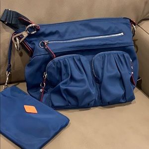 Fabrication: Nylon
Trim: Italian leather